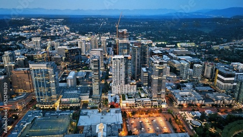 Aerial drone shot of the cityscape of Bellevue, Washington, in the evening photo