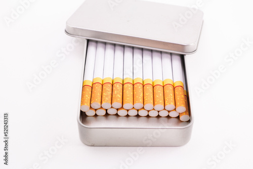 Cigarette in metal box. smoking cigarettes . cigarette filter tubes