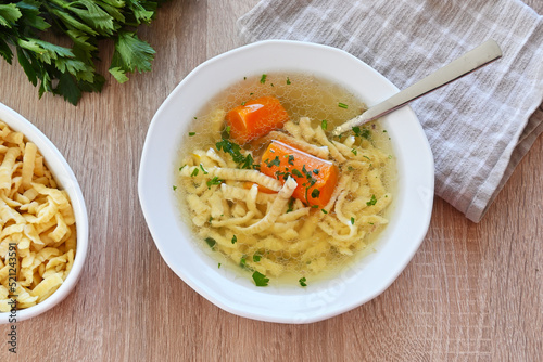 Turkey broth with noodles in a bowl