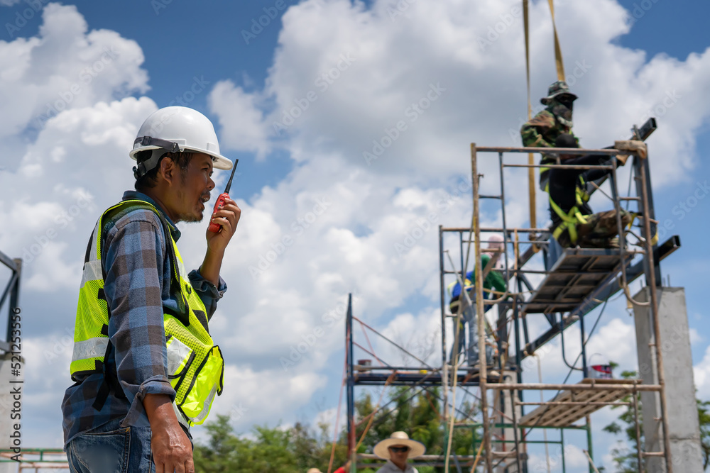 Construction engineers inspect the orderliness of the factory construction site. Construction engineers inspect the orderliness of the factory construction site.