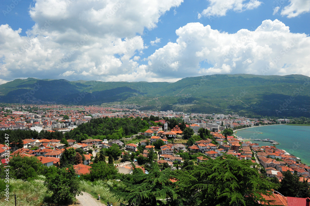 View over the town Ohrid in Macedonia on a sunny summer day. Mountains in the background. Lake slightly visible.