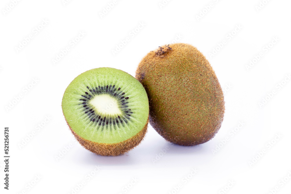Obraz premium Ripe whole kiwi fruit and cut in half isolated on white background.