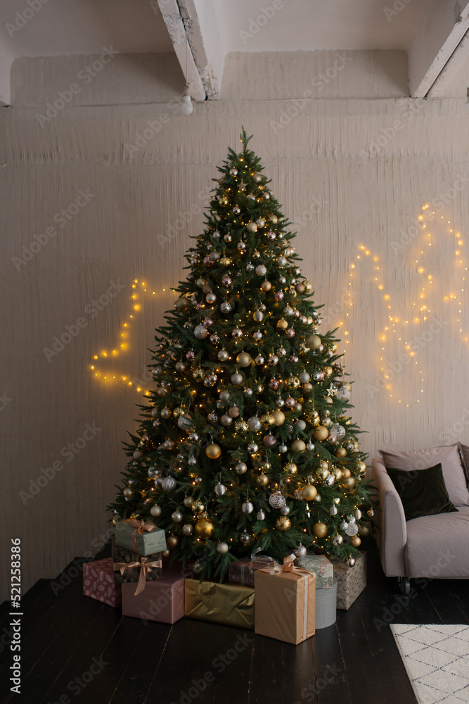 Festive decoration of the living room, Scandinavian style, Christmas tree and sofa