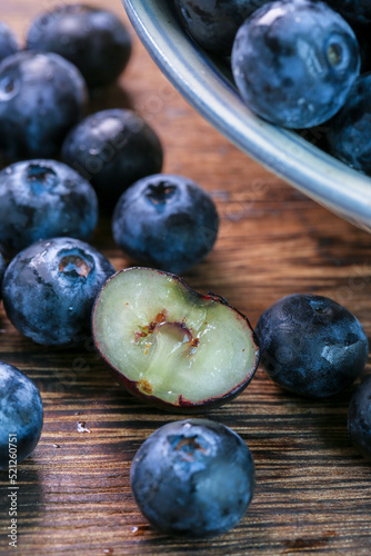 Fresh blueberries on a wooden background