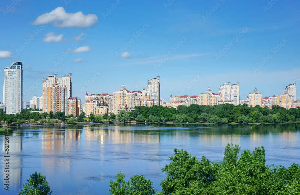                  View at residential district Obolon on the bank of Dnieper river at sunny summer day. Kyiv, Ukraine.