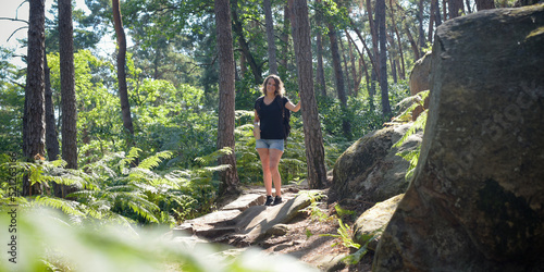 caucasian woman hiking in french forest