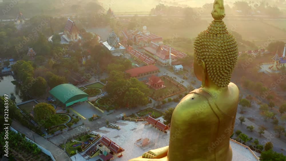 Big Buddha during sunset at Wat Muang in Ang Thong, Thailand