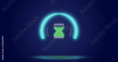 Image of processing circle and hourglass over navy background