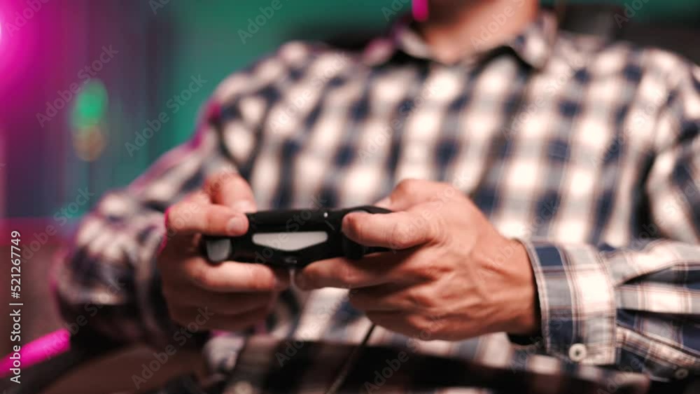 Using controller playing video games - close up of hands and joypad
Using controller playing video games - close up of hands and joypad