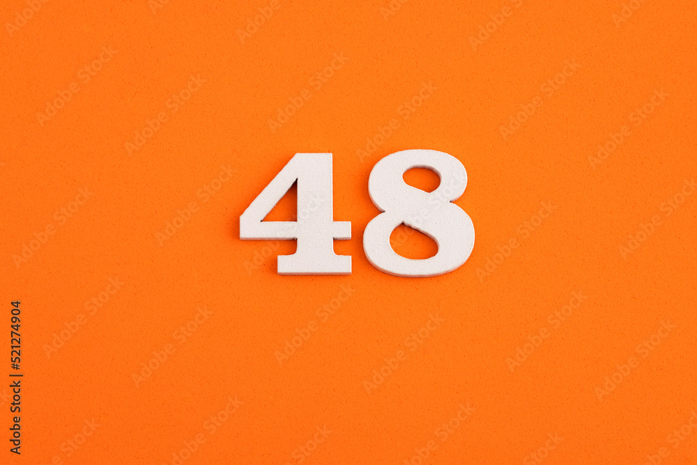 Number 48 - On orange foam rubber background