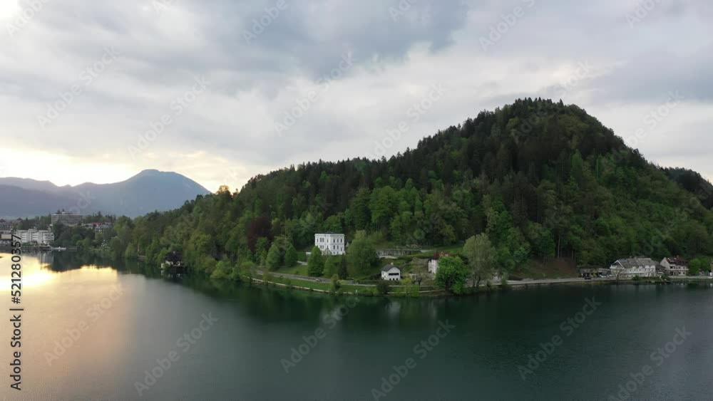 Go Everywhere. A picturesque lake surrounded by mountains in Slovenia. Lake Bled Go Everywhere. A picturesque lake surrounded by mountains in Slovenia. Lake Bled