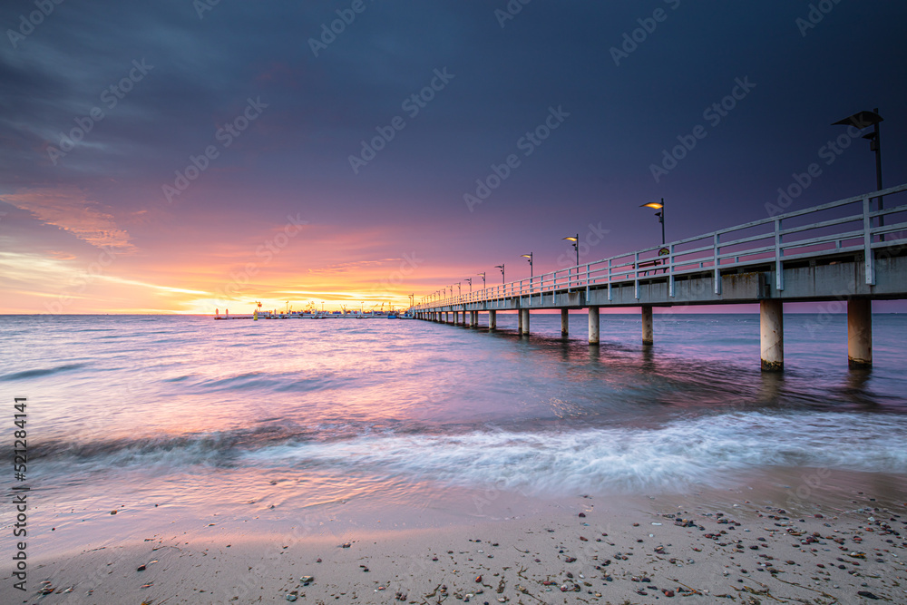 Obraz premium pier at sunset in Mechelinki
