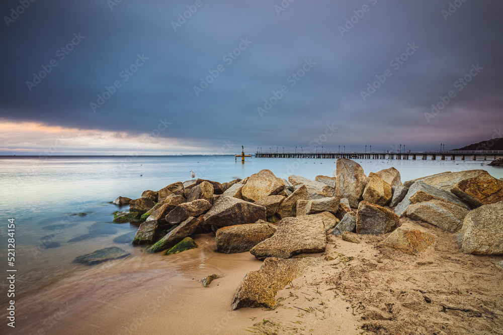 Amazing sunrise over the pier in Gdynia Orlowo