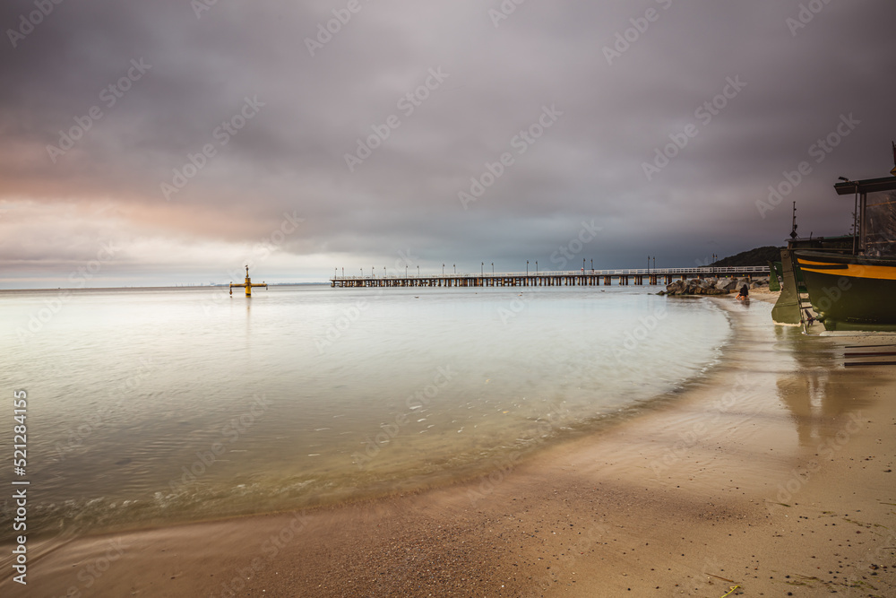 Amazing sunrise over the pier in Gdynia Orlowo