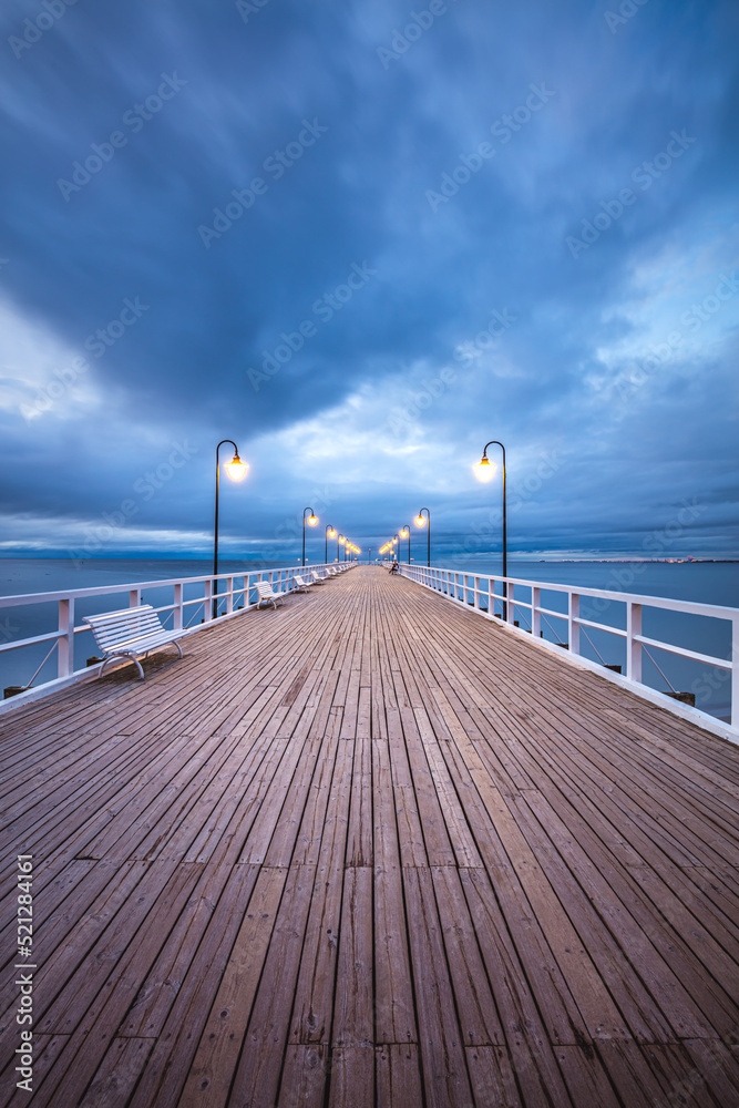 Fototapeta premium Amazing sunrise over the pier in Gdynia Orlowo