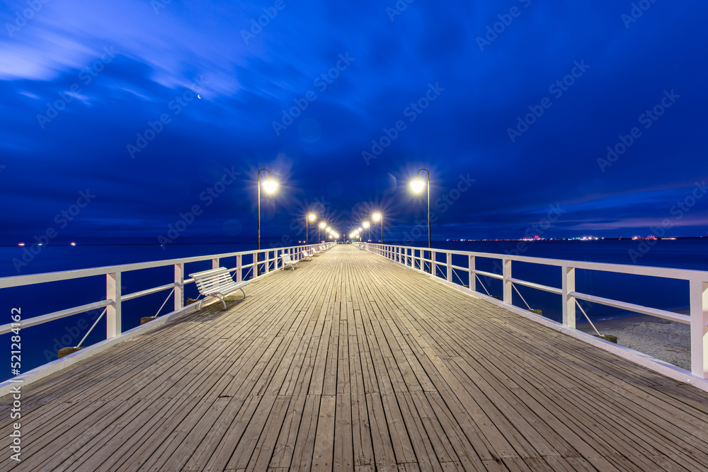 Amazing sunrise over the pier in Gdynia Orlowo