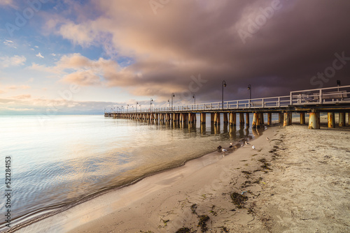 Amazing sunrise over the pier in Gdynia Orlowo