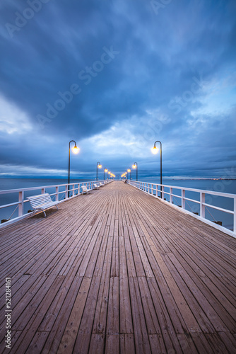 Amazing sunrise over the pier in Gdynia Orlowo