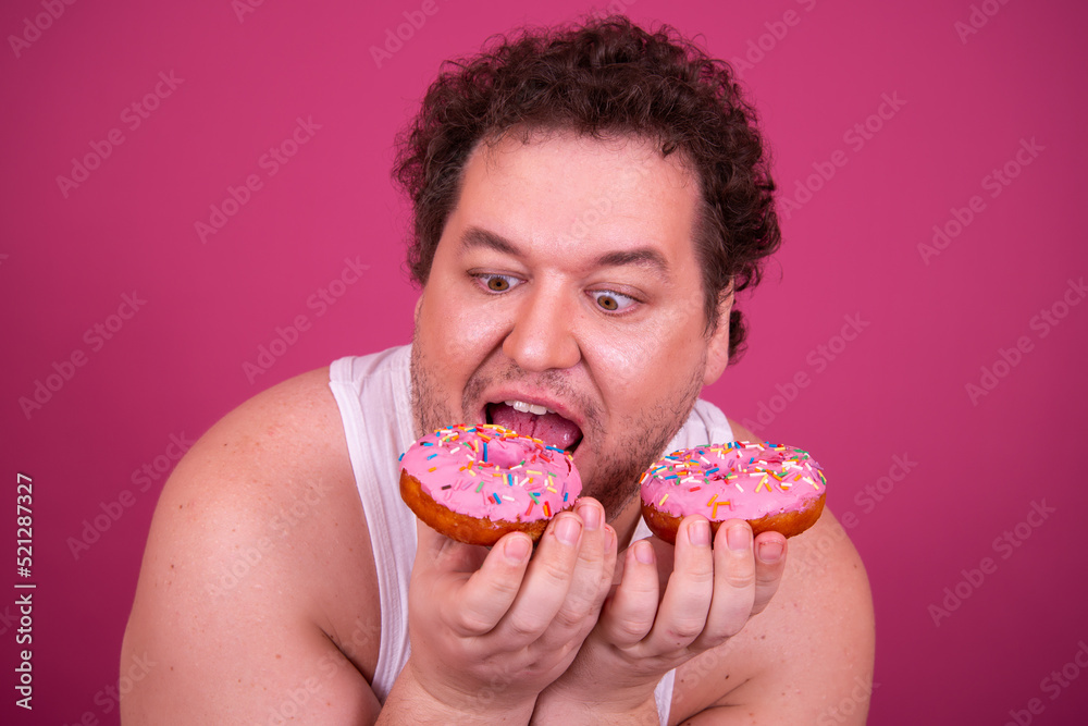 Breakfast and sports. Funny fat man eats donuts. Breakfast and sports. Funny fat man eats donuts.