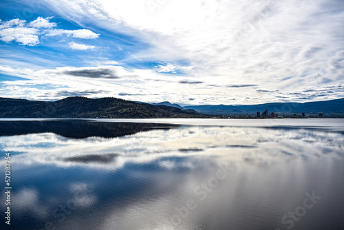 Clouds on lake and mountains © miranda