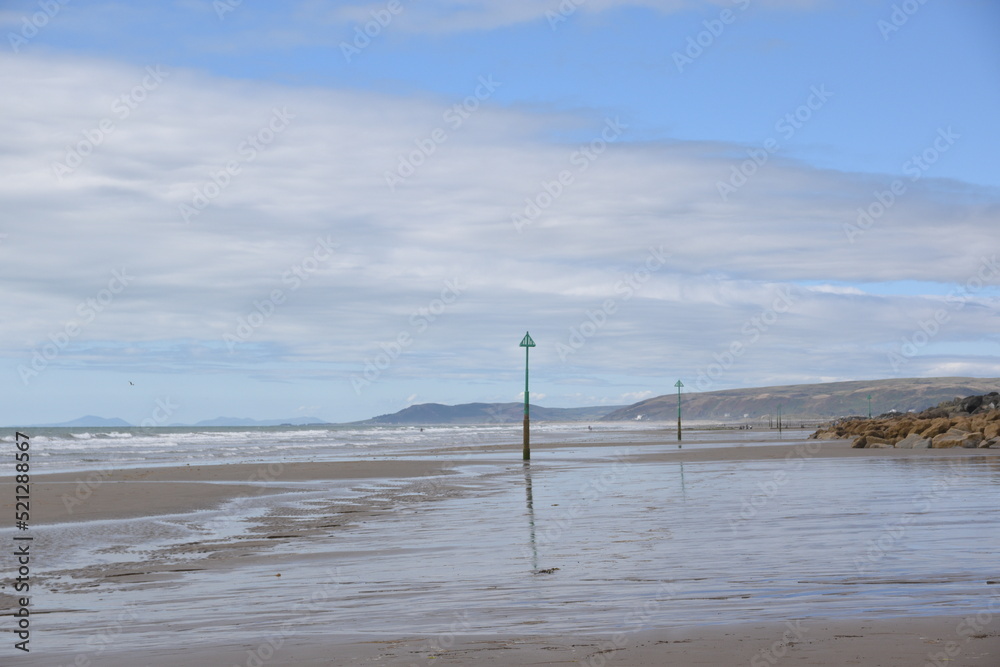the beach groynes at Borth beach in ceredigion the beach groynes at Borth beach in ceredigion
