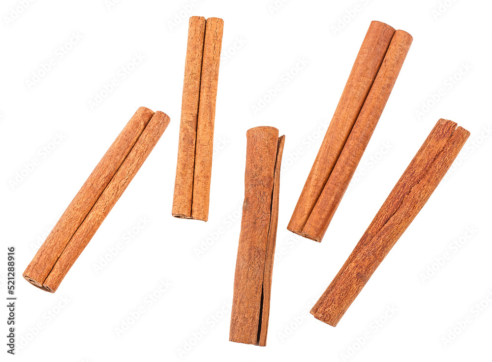 Aromatic cinnamon sticks isolated on a white background, top view. Aromatic cinnamon sticks isolated on a white background, top view.