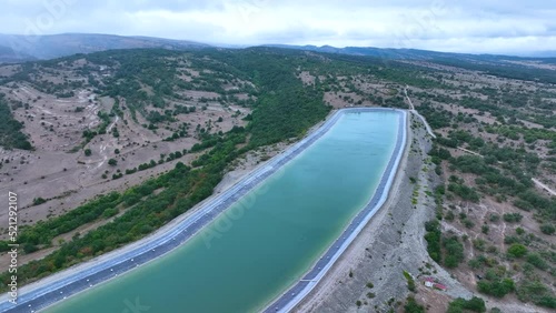 Irrigation pond near Villota de Losa in the surroundings of Quincoces de Yuso. Aerial view from a drone. Losa Valley. The Merindades. Burgos. Castile and Leon. Spain. Europe
 photo