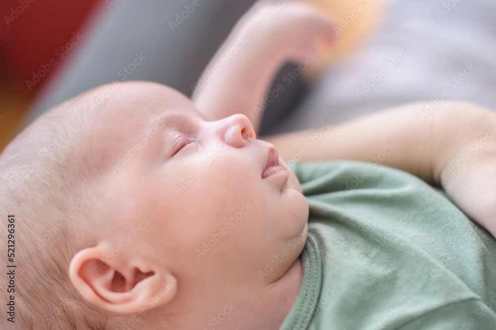 Cute detail macro portrait view of peaceful baby head face, calm sleeps soundly. Beautiful child sleeping and resting Cute detail macro portrait view of peaceful baby head face, calm sleeps soundly. Beautiful child sleeping and resting