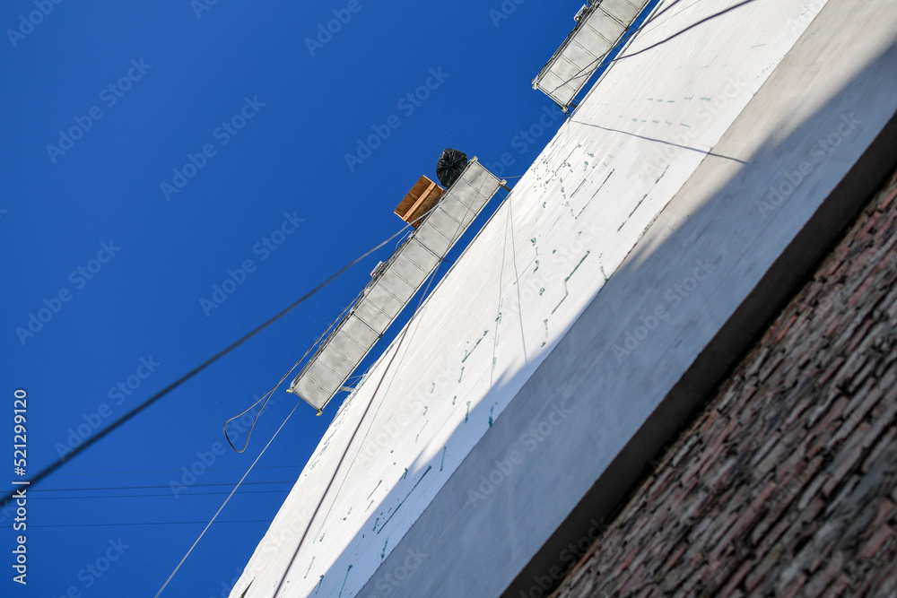 View of Insulating facade of high-rise appartment building with styrofoam wall ...