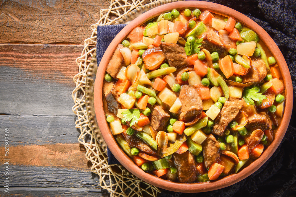 Arabic Cuisine: The Torley casserole with meat. It's a mixture of meat and vegetables in a delicious sauce with special spices. Top view with close up. Arabic Cuisine: The Torley casserole with meat. It's a mixture of meat and vegetables in a delicious sauce with special spices. Top view with close up.