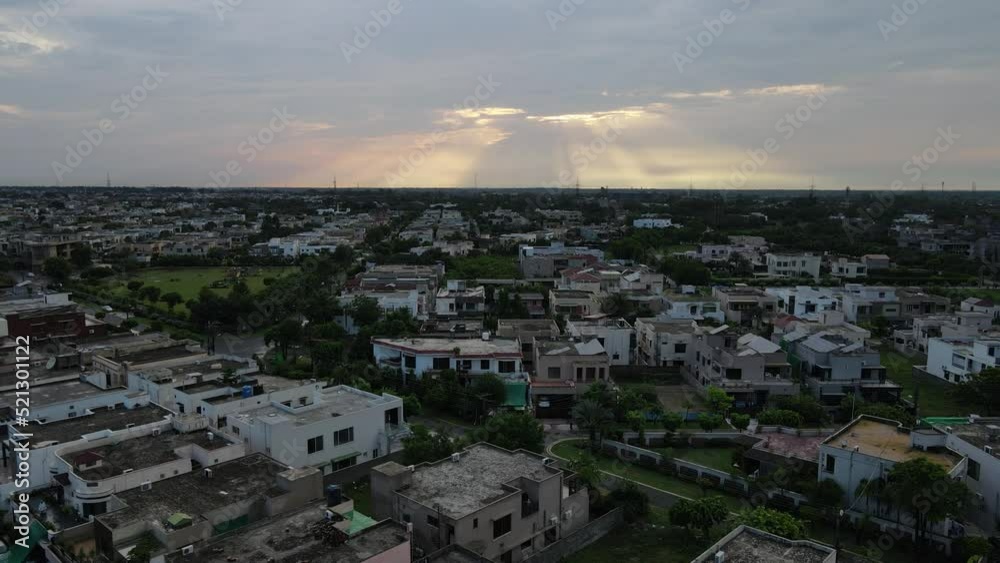 Dramatic clouds after rain during sunset over an urban area of Lahore in Pakistan's Punjab province. Dramatic clouds after rain during sunset over an urban area of Lahore in Pakistan's Punjab province.
