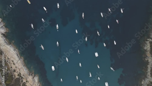 Aerial view of sailing boat along Fetovaia Bay at sunset, Seccheto, Elba Island, Tuscany, Italy. photo