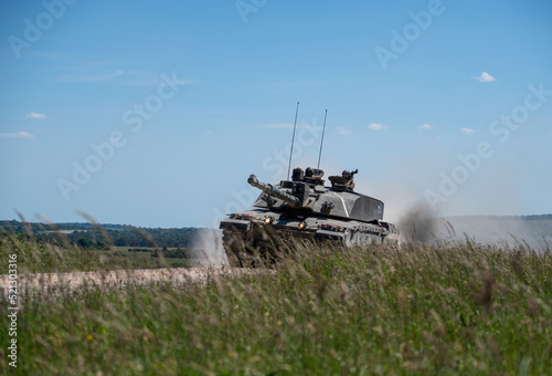 Fototapet close-up of a British army Challenger 2 ii FV4034 main battle tank in high speed