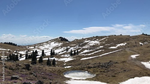 Beautiful shot of patches of snow on the Velika Planina plateau, Slovenia photo