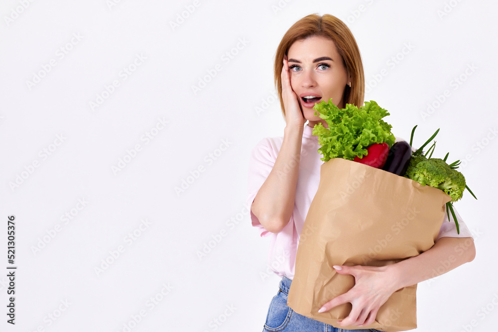 caucasian woman hold paper bag with vegetables caucasian woman hold paper bag with vegetables