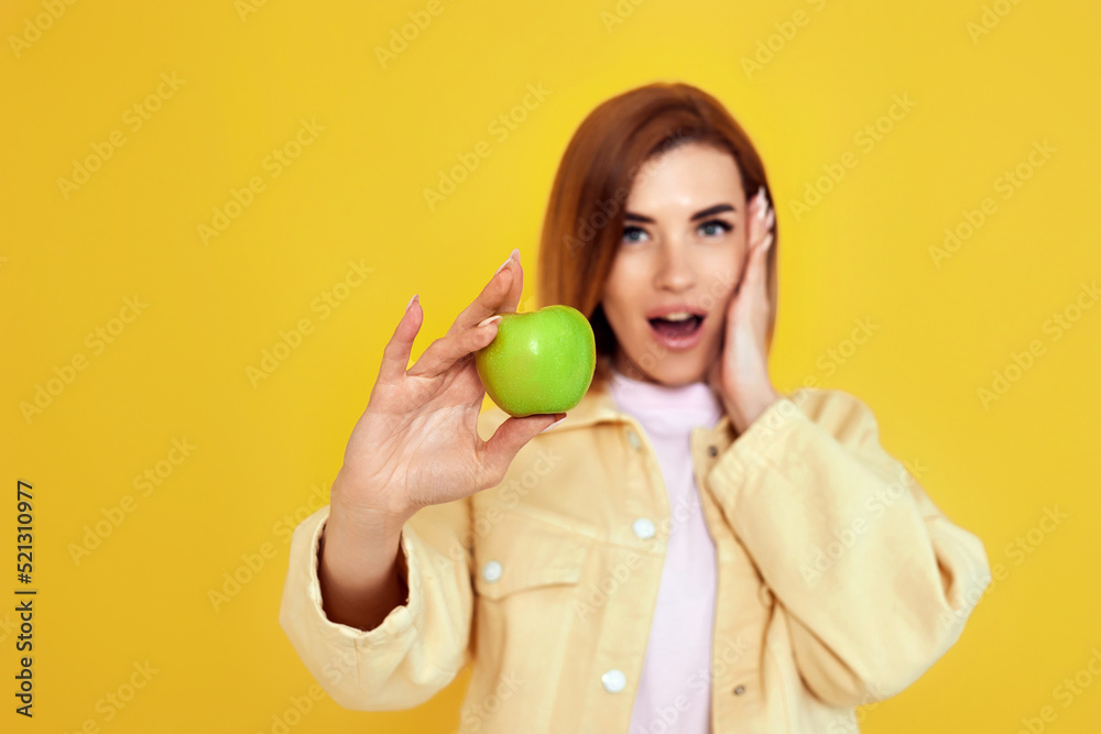 girl holding green apple isolated on white background girl holding green apple isolated on white background