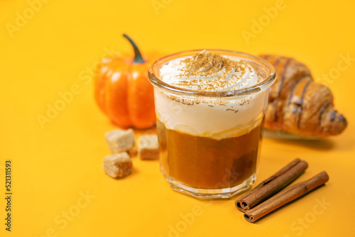 Pumpkin spiced Latte Coffee with whipped cream in a glass