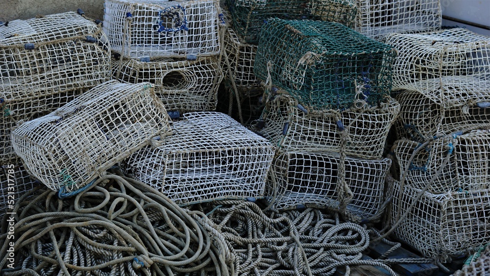 traps for octopuses and crabs stacked in the harbor