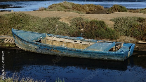 rustic wooden boat on the lagoon