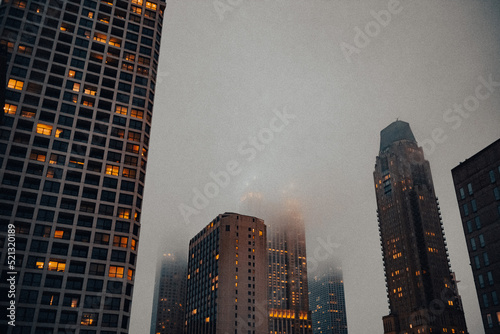 city skyline on foggy night