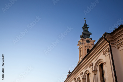 Steeple tower of hram uspenja presvete bogorodice, the Serbian orthodox Church of Crepaja a 19th century old Austro Hungarian style church, with its typical baroque clocktower. ....
