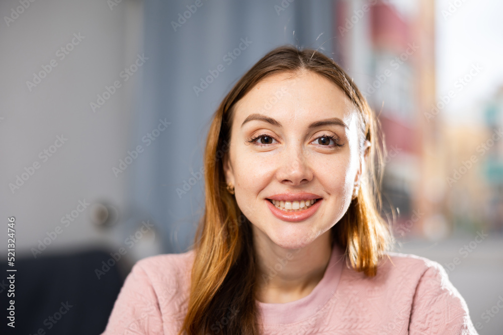 Portrait of a positive young european woman. Close-up portrait