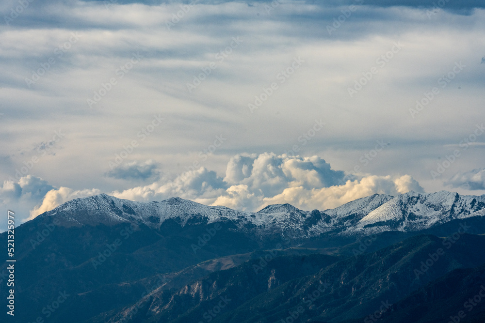 Clouds Brew Over Snow Capped Mountains in Colorado Clouds Brew Over Snow Capped Mountains in Colorado