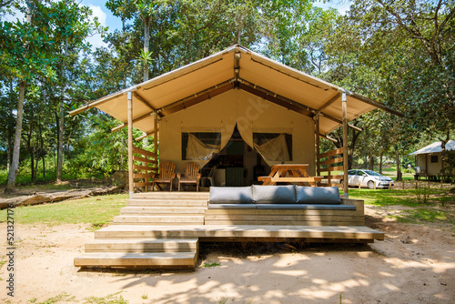 Budget Safari tent in South Africa for family vacations in nature , Safari tented camp in green forest bush nature photo