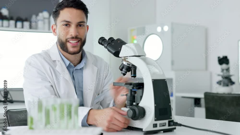Innovation, science and medical research in a lab with a confident scientist. Portrait of a handsome health care professional conducting experiments with a microscope, cure or treatment discovery Innovation, science and medical research in a lab with a confident scientist. Portrait of a handsome health care professional conducting experiments with a microscope, cure or treatment discovery