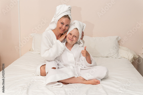 Daughter dries smiling bath love mom thinks elbows coffee bathrobe, concept girl morning from pretty from hotel beauty, child baby. Head kid comfort,