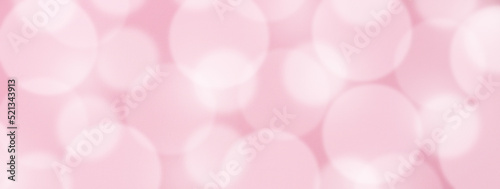 Blurred pink background. Mo...