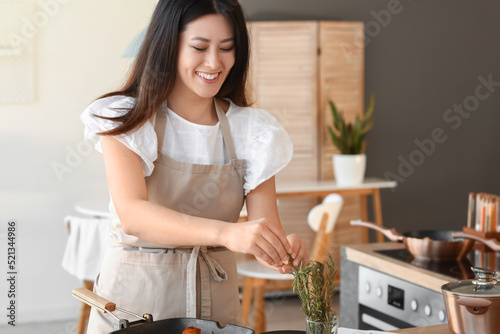 Young Asian woman taking ro...