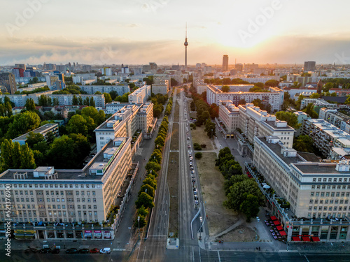 Scenic aerial shot of Berlin with TV Tower in golden light photo