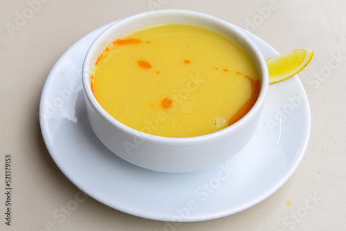 Lentil ( mercimek ) soup with melted butter and red pepper sauce